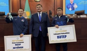 Нұрлыбек Нәлібаев әлем чемпионына пәтер және көлік кілтін табыстады